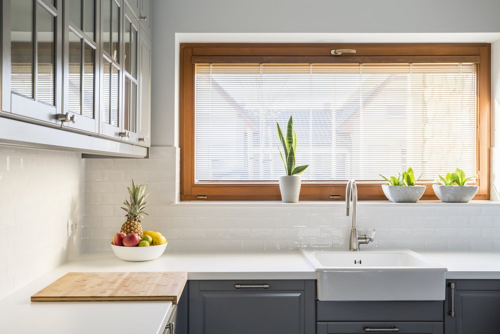 white and grey kitchen in sustainable materials