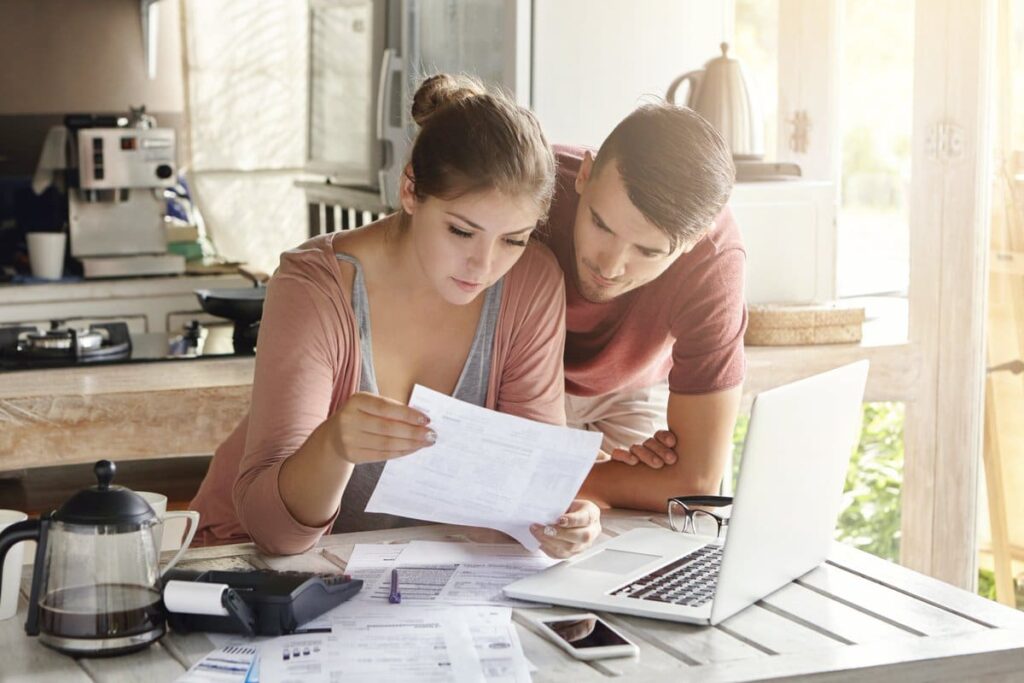 young couple renovating their kitchen on a budget 1