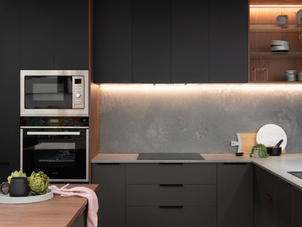 Modern kitchen with sleek appliances.