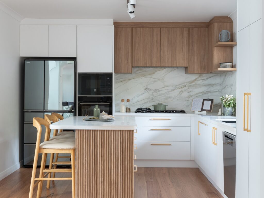timber and white kitchen with stunning stone splashback