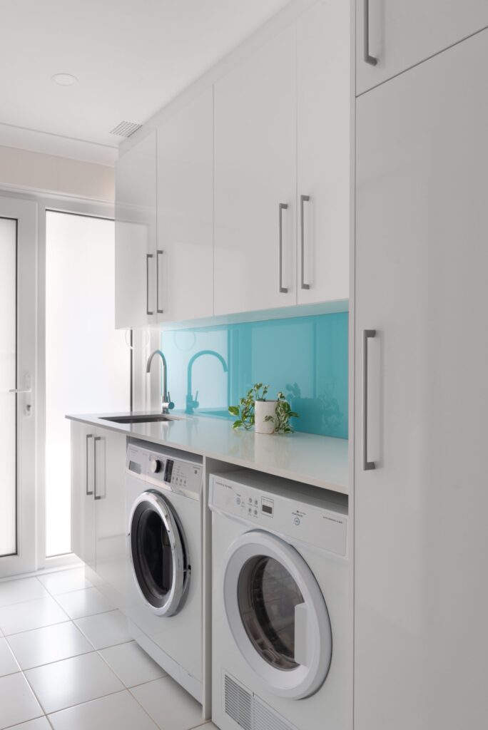 Kitchen Craftsmen Renovated All White Laundry