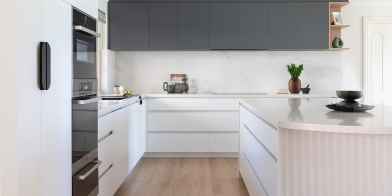 White Black Kitchen Renovation by Kitchen Craftsmen