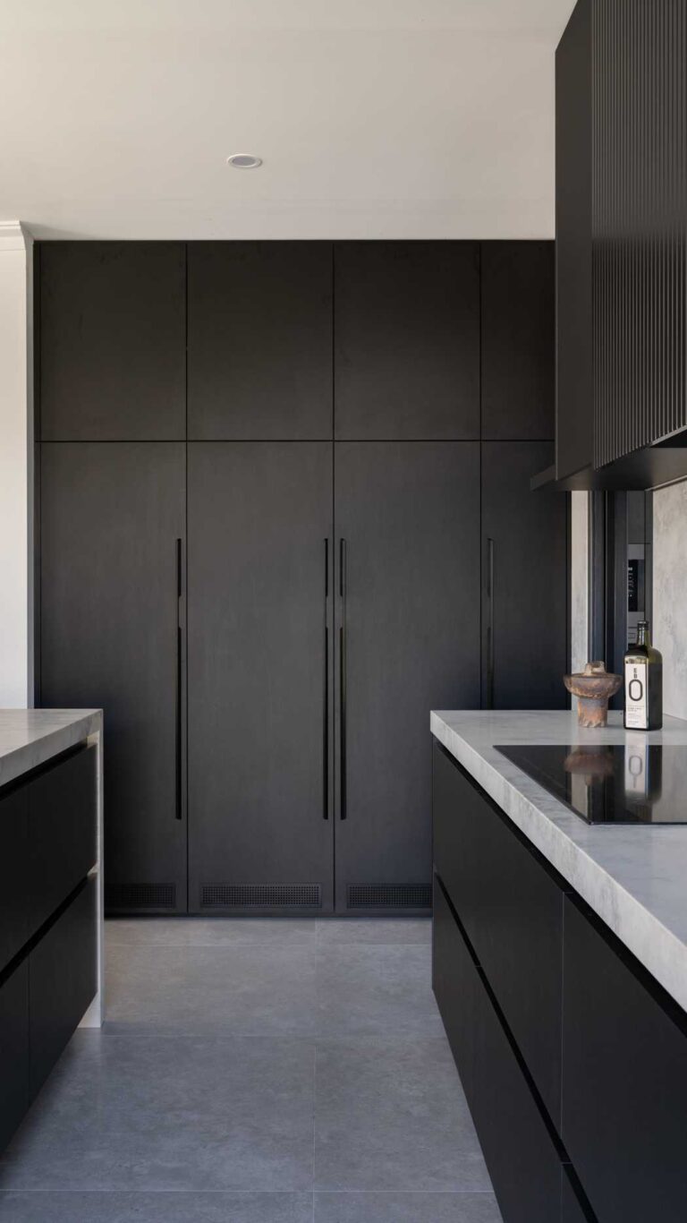 Grey Marble kitchen with black cabinetry