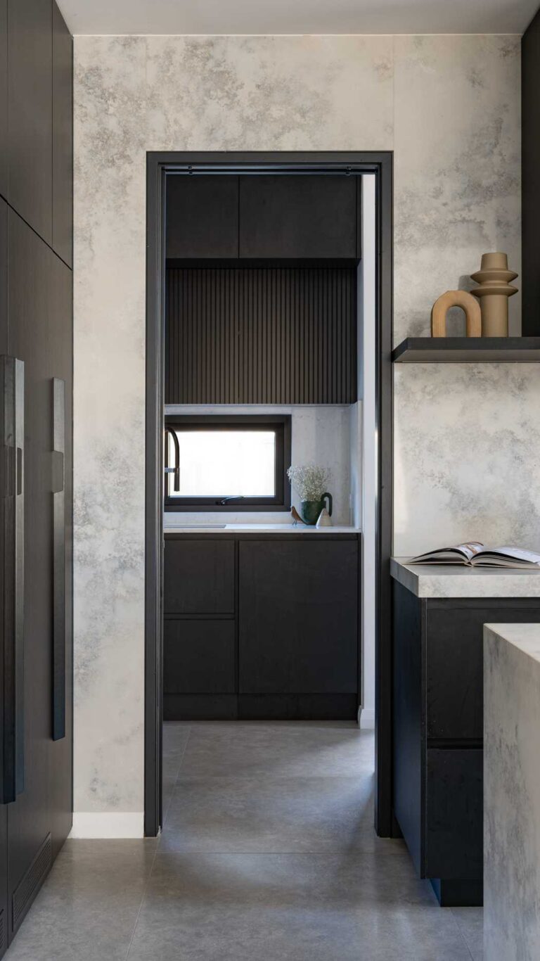 Grey Marble kitchen with black cabinetry