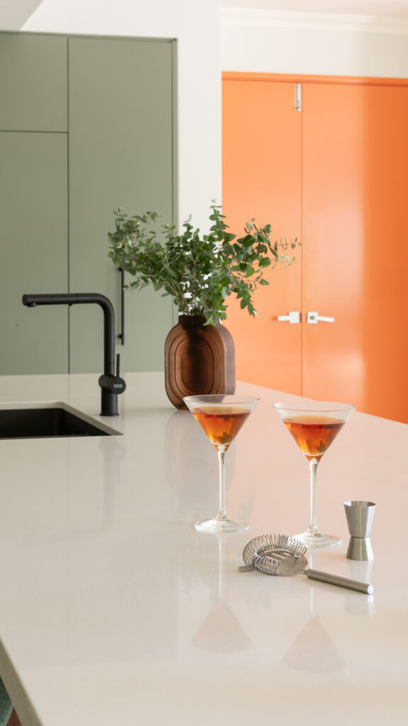 How To Create A Kitchen Made For Entertaining 1 Elegant cocktails on a modern countertop.