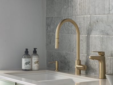 gold tapware in scullery by Kitchen Craftsmen Perth