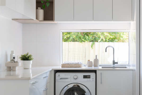laundry with window splashback